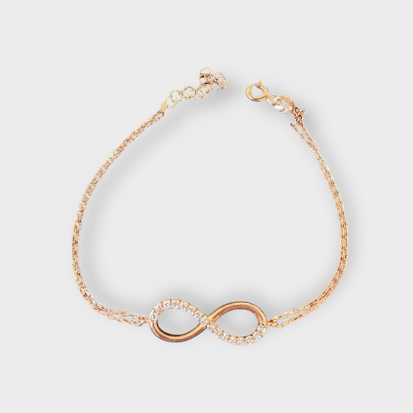 Armband / Zirkonia / Infinity / Roségold vergoldet 925er Sterlingsilber