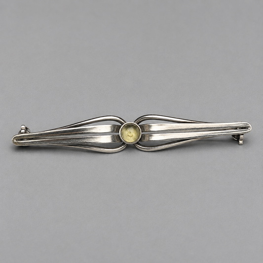 Brosche aus 935 Silber mit gelbem Cabochon